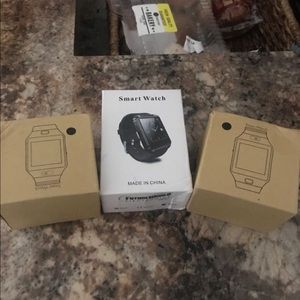 3 unopened smart watches